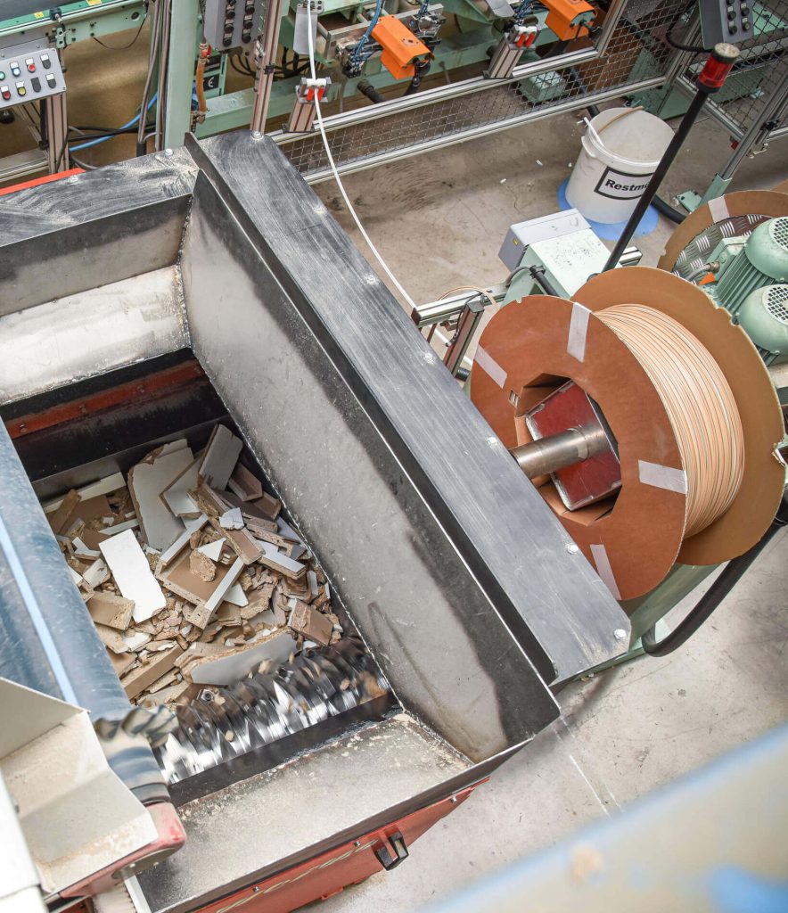 Once the hopper is filled, the shredder goes into automatic mode.