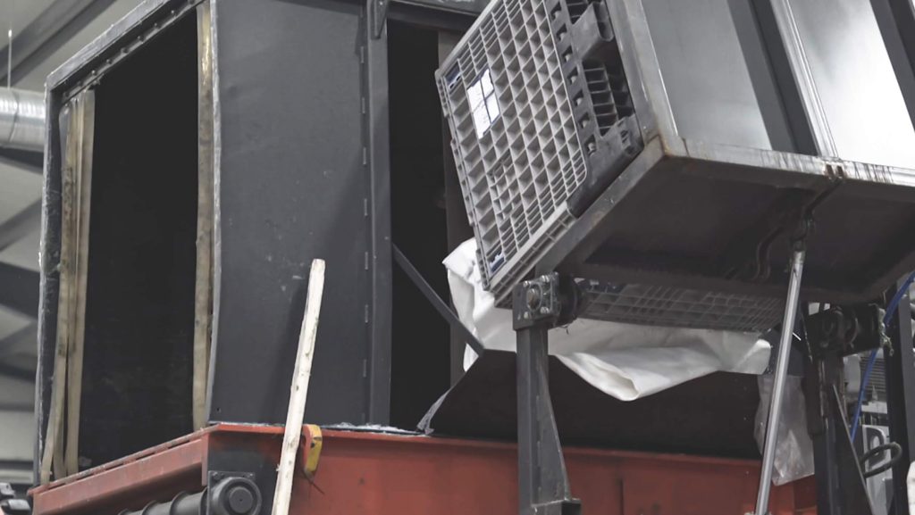 Plastic is fed into the hopper via a tilting system