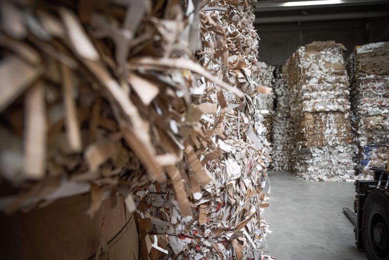 Waste paper and corrugated boards are delivered in bales.