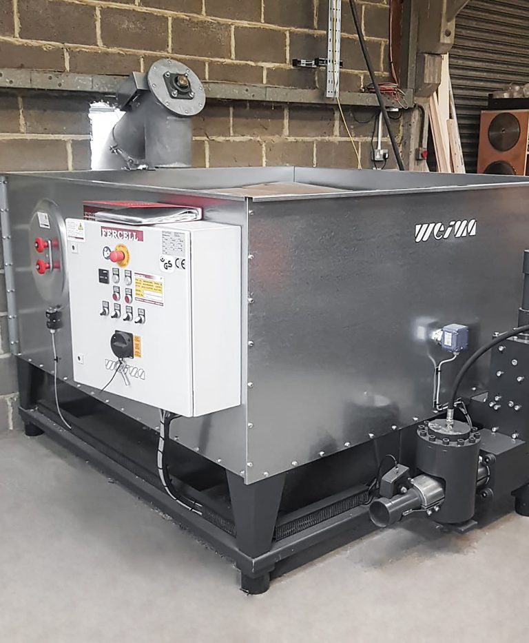 Briquetting press for wood waste at Hutchings Timber