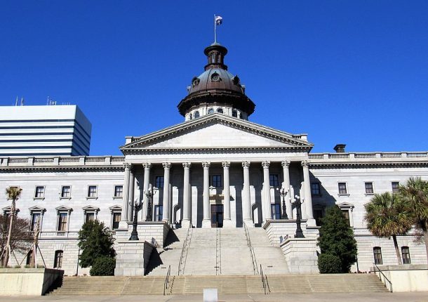 Photo of the South Carolina Statehouse from the front steps, Photo credit: Farragutful, CC BY-SA 4.0 , via Wikimedia Commons