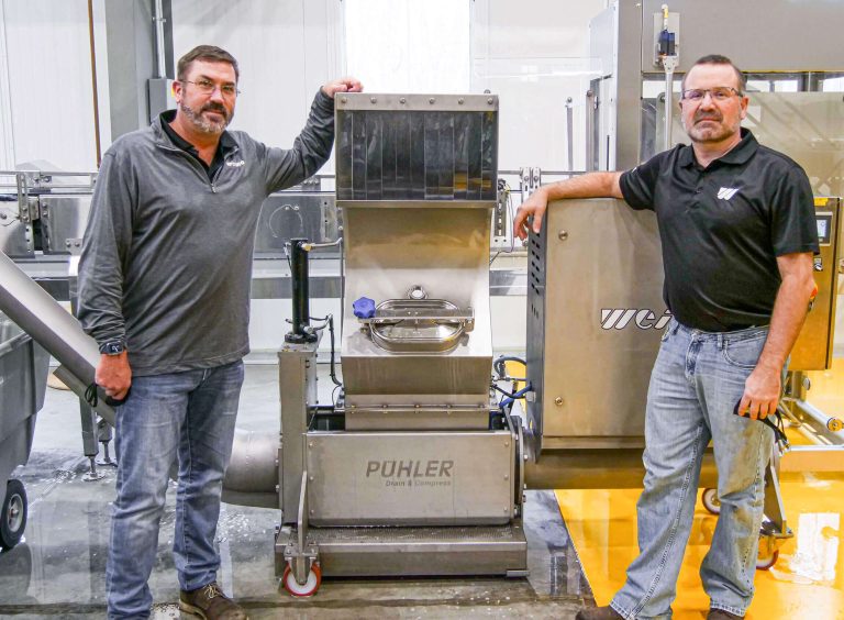 WEIMA employees aside PUEHLER E.200 drainage press for aluminum cans