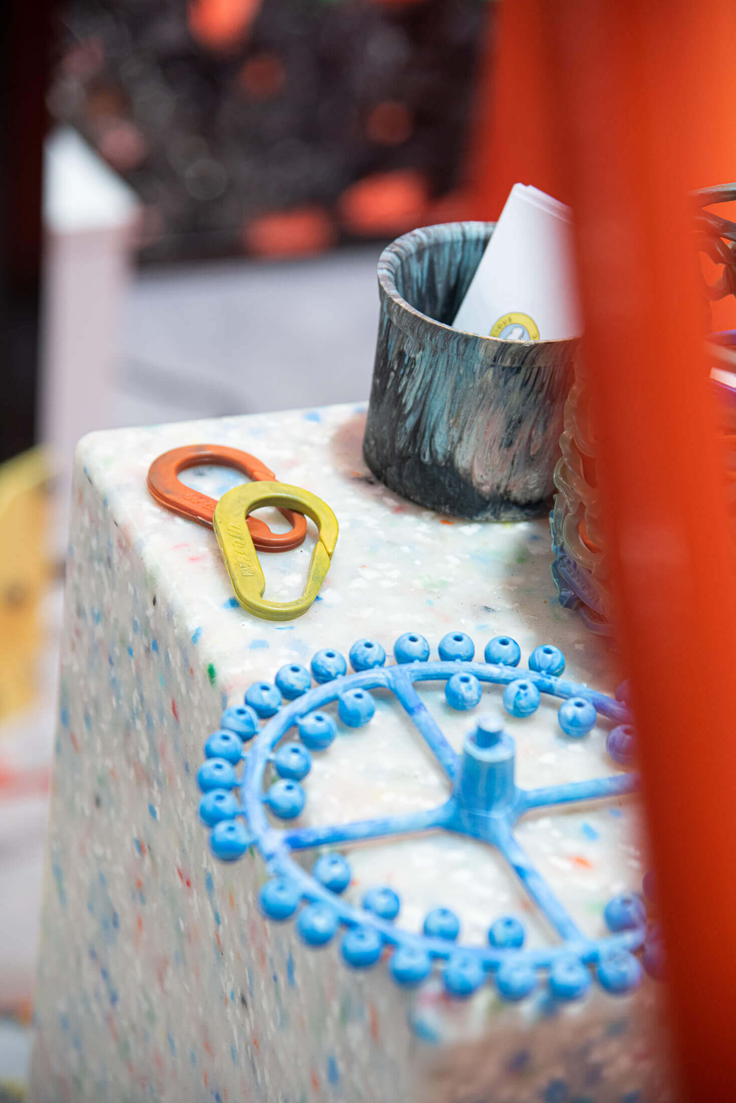 colorful carabiners and other recycled plastic items