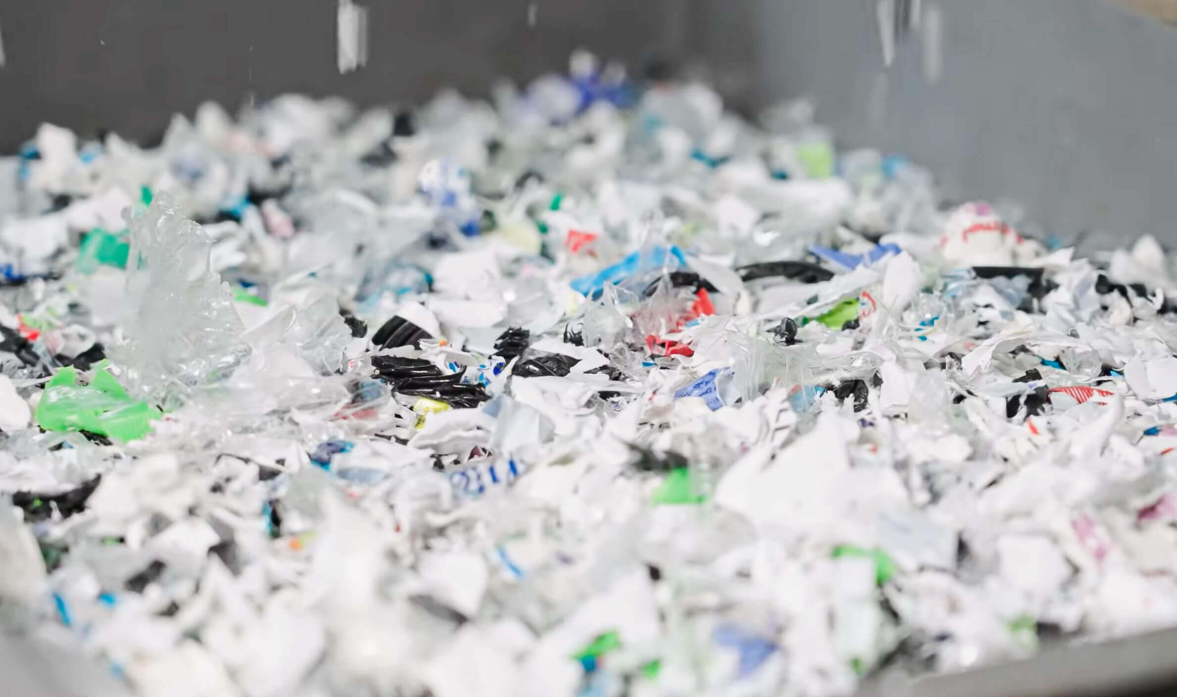 colorful Post-consumer plastics after shredding