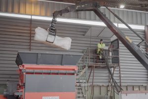 A crane that transports the PE blocks into the S7.20