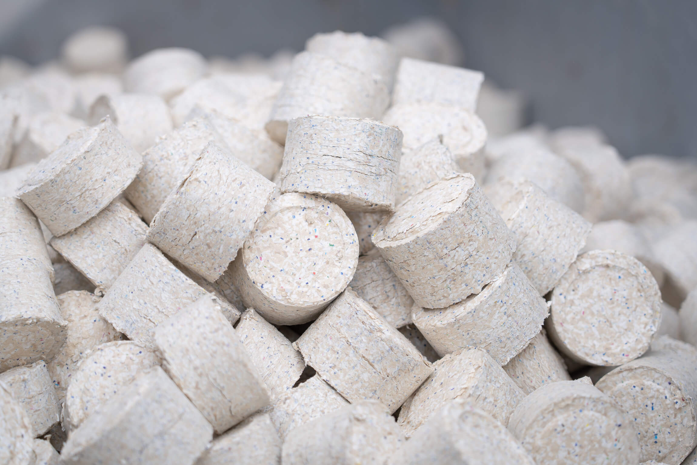 Many briquettes stored in a hall