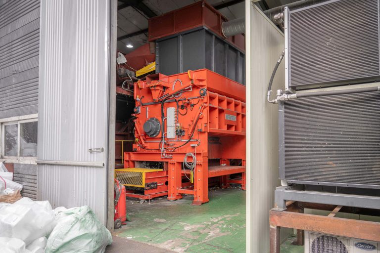 View of the WEIMA PowerLine 2500 single-shaft shredder in an industrial hall