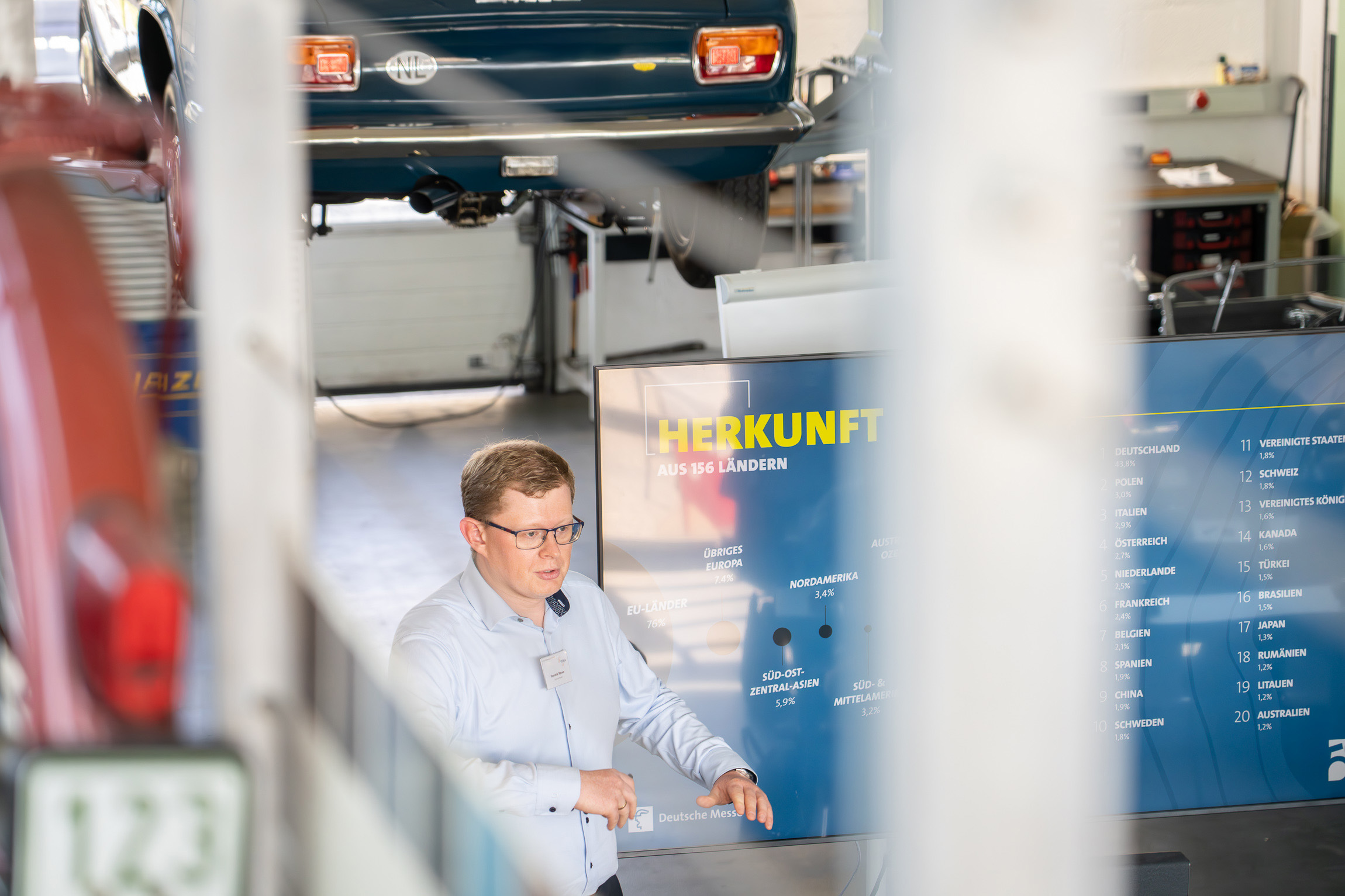 You see a man giving a lecture at LIGNA