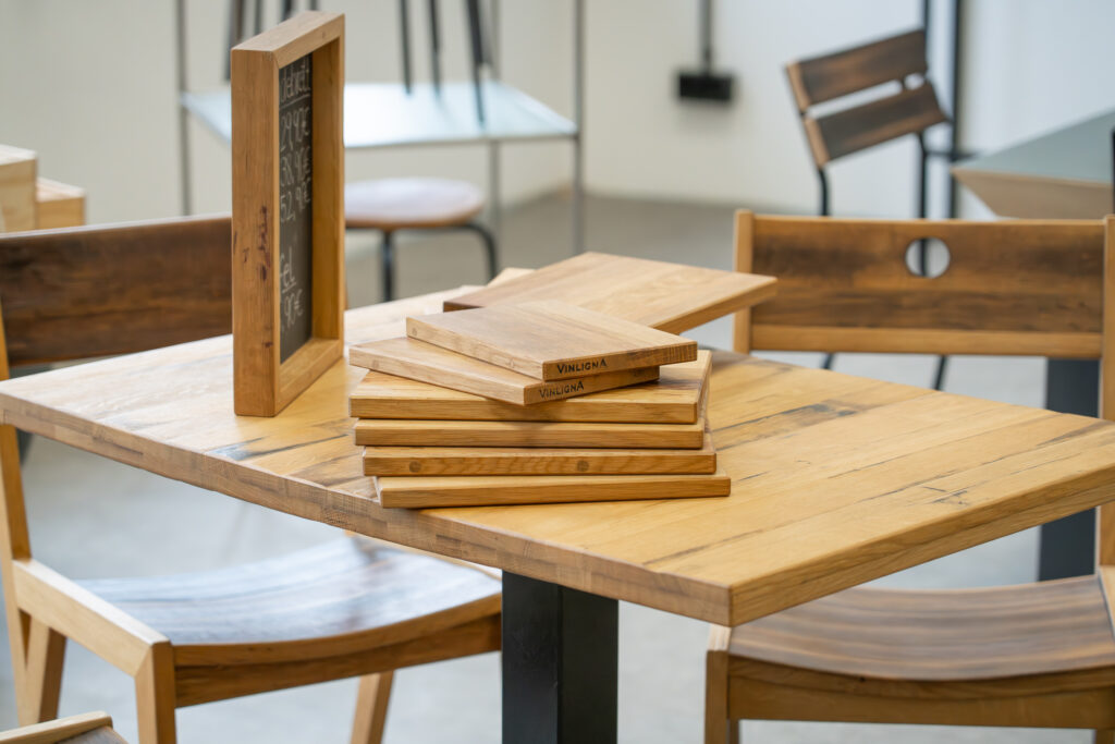 The handmade furniture is on display in the showroom.