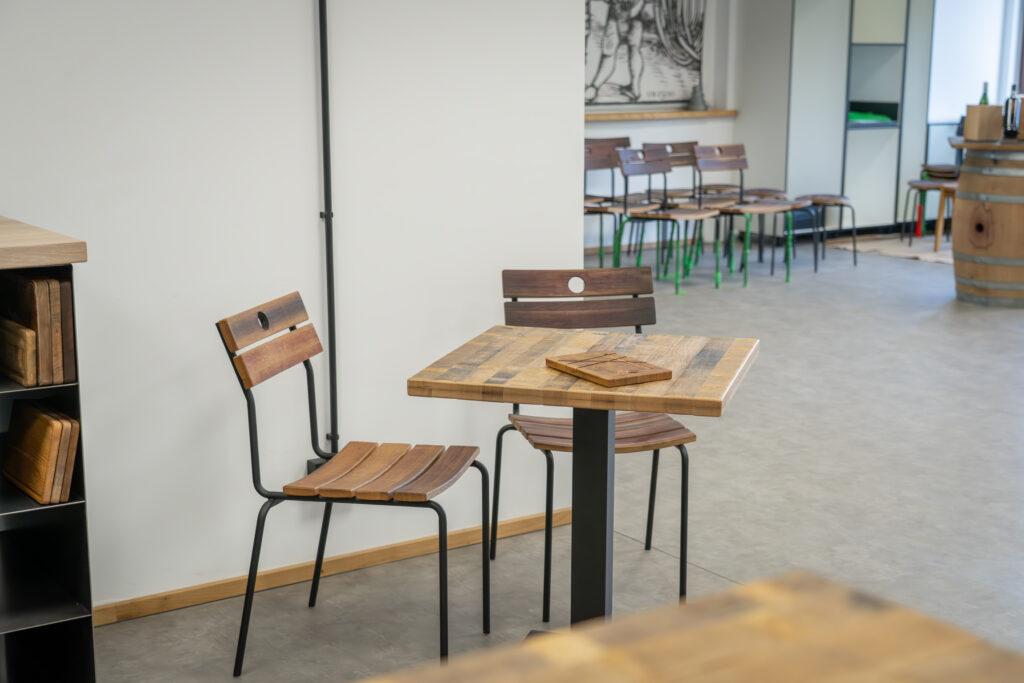 The handmade furniture is on display in the showroom.